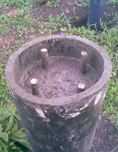 Фундамент из асбестовых труб. Фото